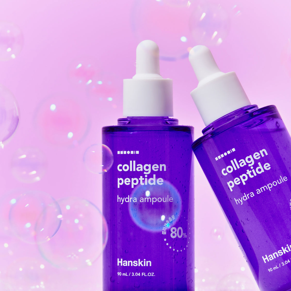 HANSKIN Collagen Peptide Hydra Ampoule 90ml on pink background with bubbles, showcasing skincare product design and packaging.