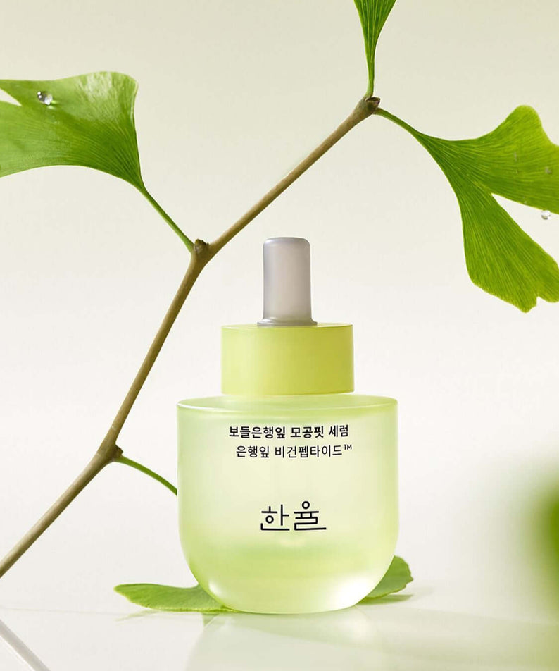 HANYUL Bodunhaengip Pore Fir Serum in a green bottle with natural leaf decor, ideal for skincare enthusiasts.