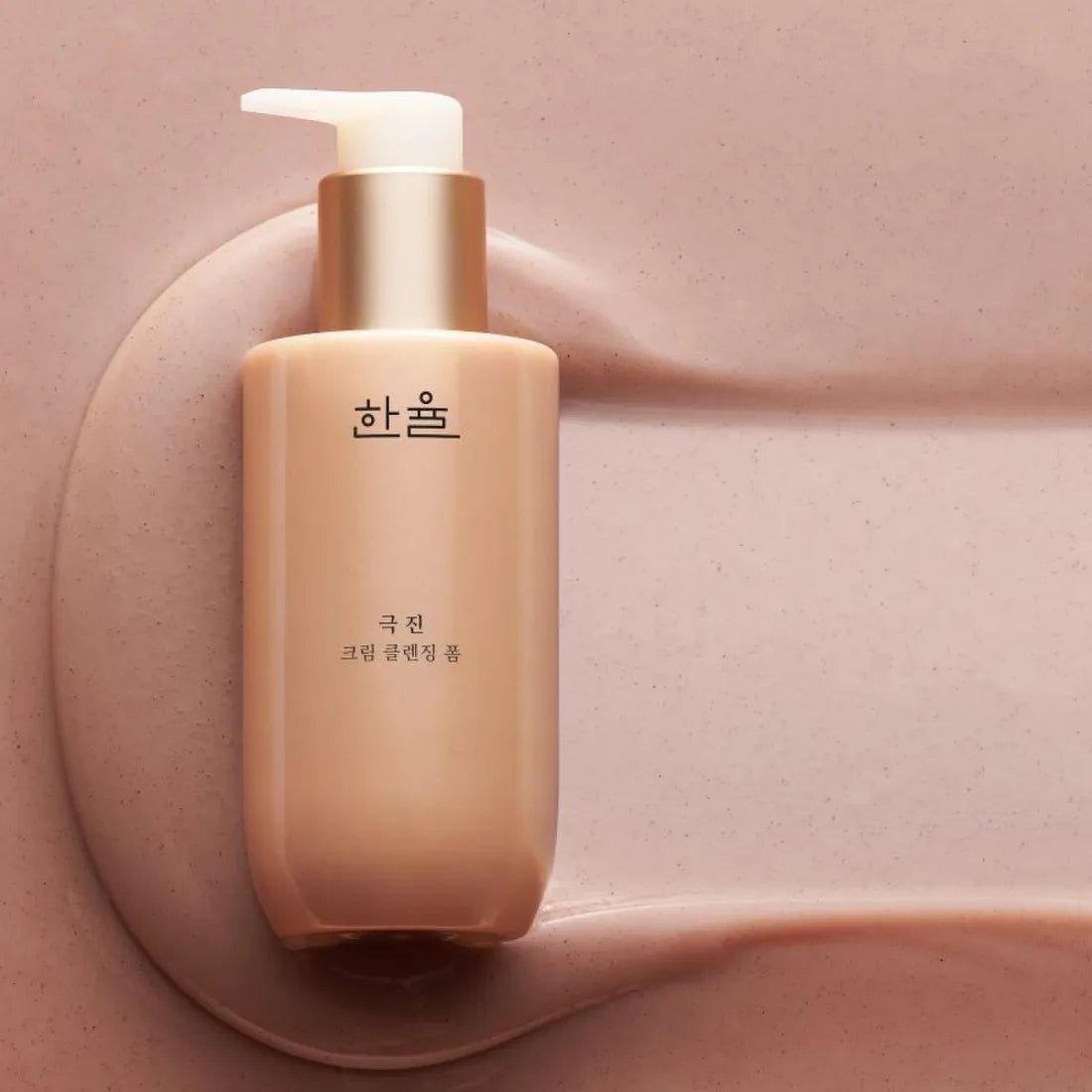 HANYUL Extreme Cream Cleansing Foam 200ml in pink setting, luxury skincare product with pump dispenser