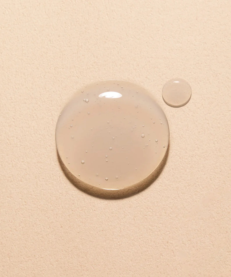 Texture of HANYUL Extreme Skin 125ml serum on a neutral background