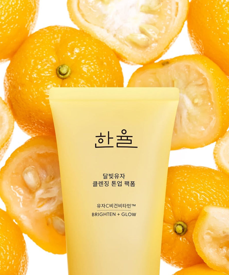 HANYUL Moonlight Yuja Vitamin Tone-Up Pack Foam 120ml with fresh citrus in background