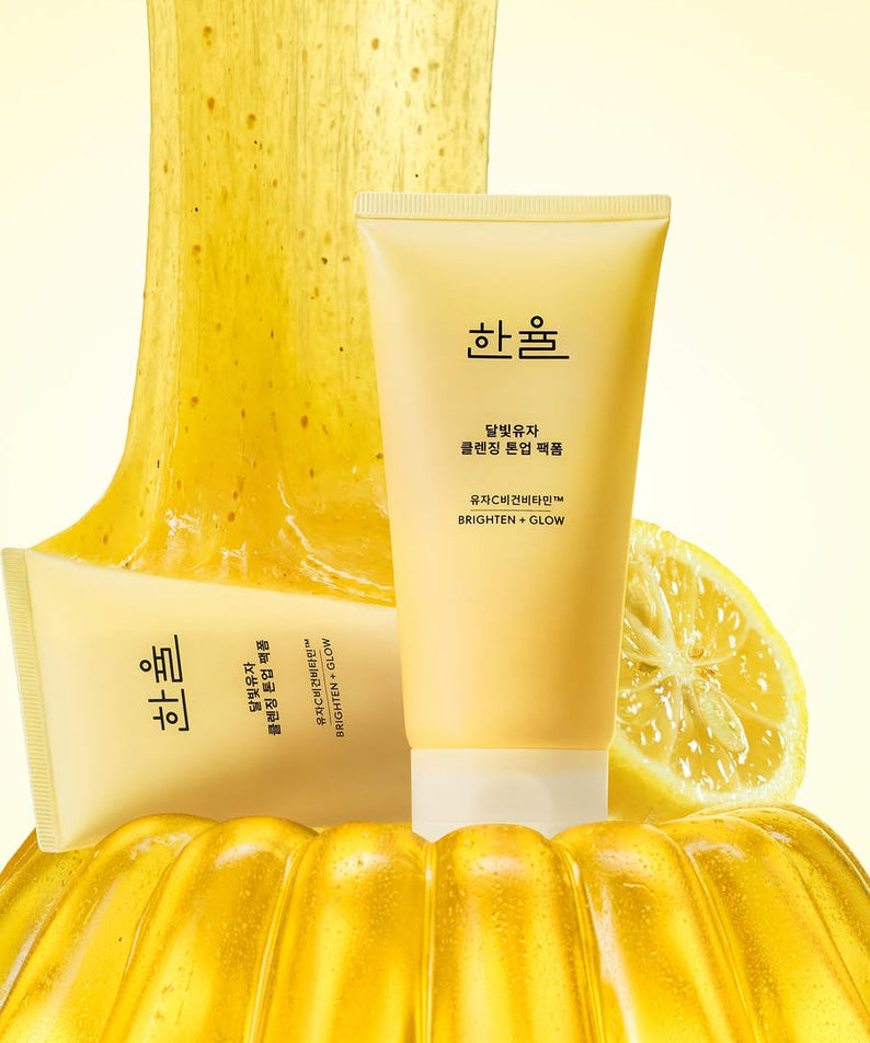 HANYUL Moonlight Yuja Vitamin Tone-Up Pack Foam 120ml with citrus background, showcasing skincare product benefits.