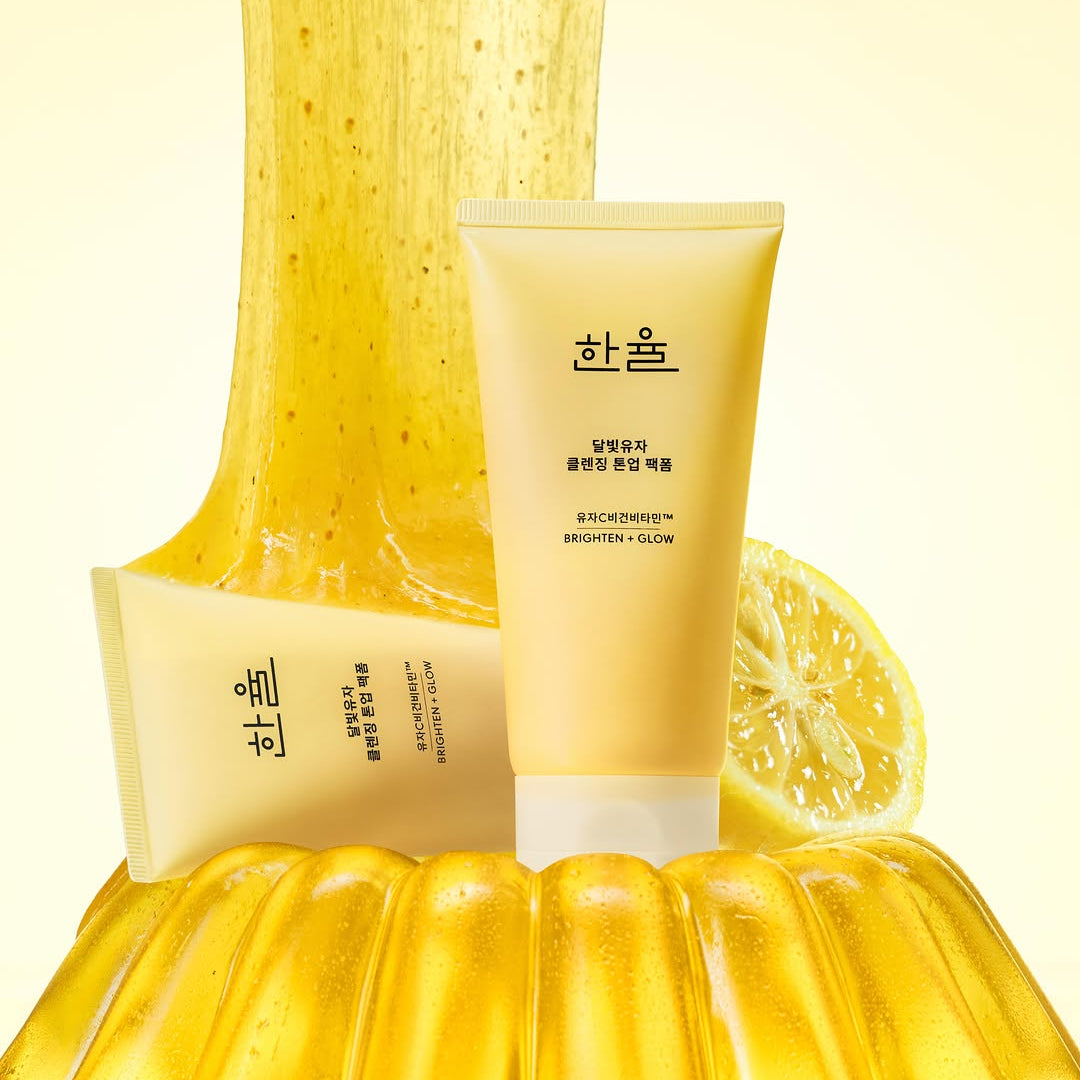 HANYUL Moonlight Yuja Vitamin Tone-Up Pack Foam 120ml with citrus background, showcasing skincare product benefits.