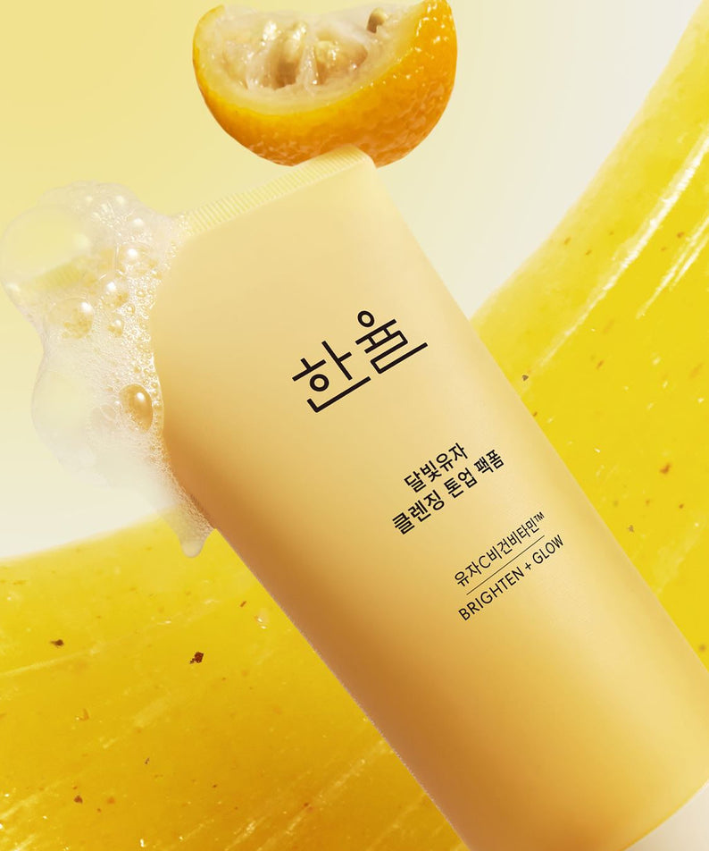 HANYUL Moonlight Yuja Vitamin Tone-Up Pack Foam 120ml skincare product with foam and yuja in background.