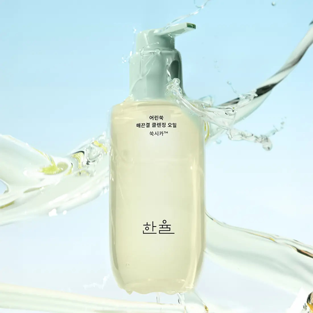 HANYUL Young Artemisia Smooth Cleansing Oil 200ml bottle with splash effect against a light blue background