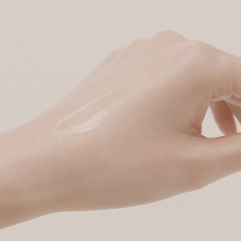 Texture of HARU HARU Black Rice Hyaluronic Essence 50ml on skin