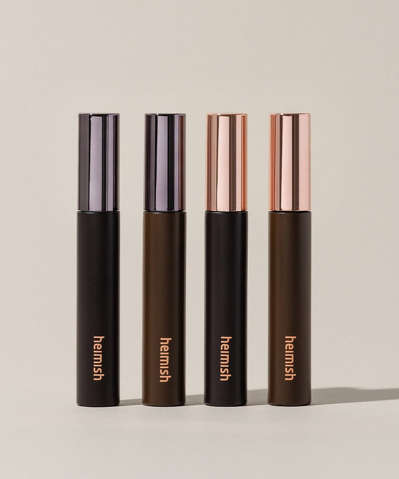 HEIMISH Dailism Mascara in four different shades with sleek packaging.