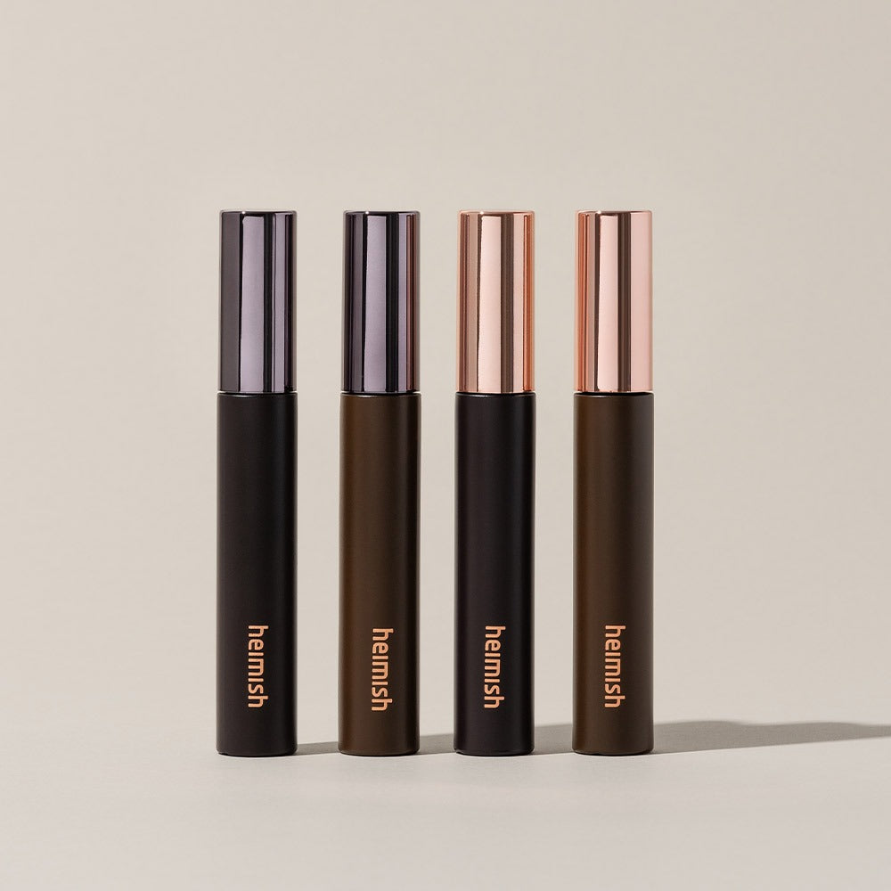 HEIMISH Dailism Mascara in four different shades with sleek packaging.