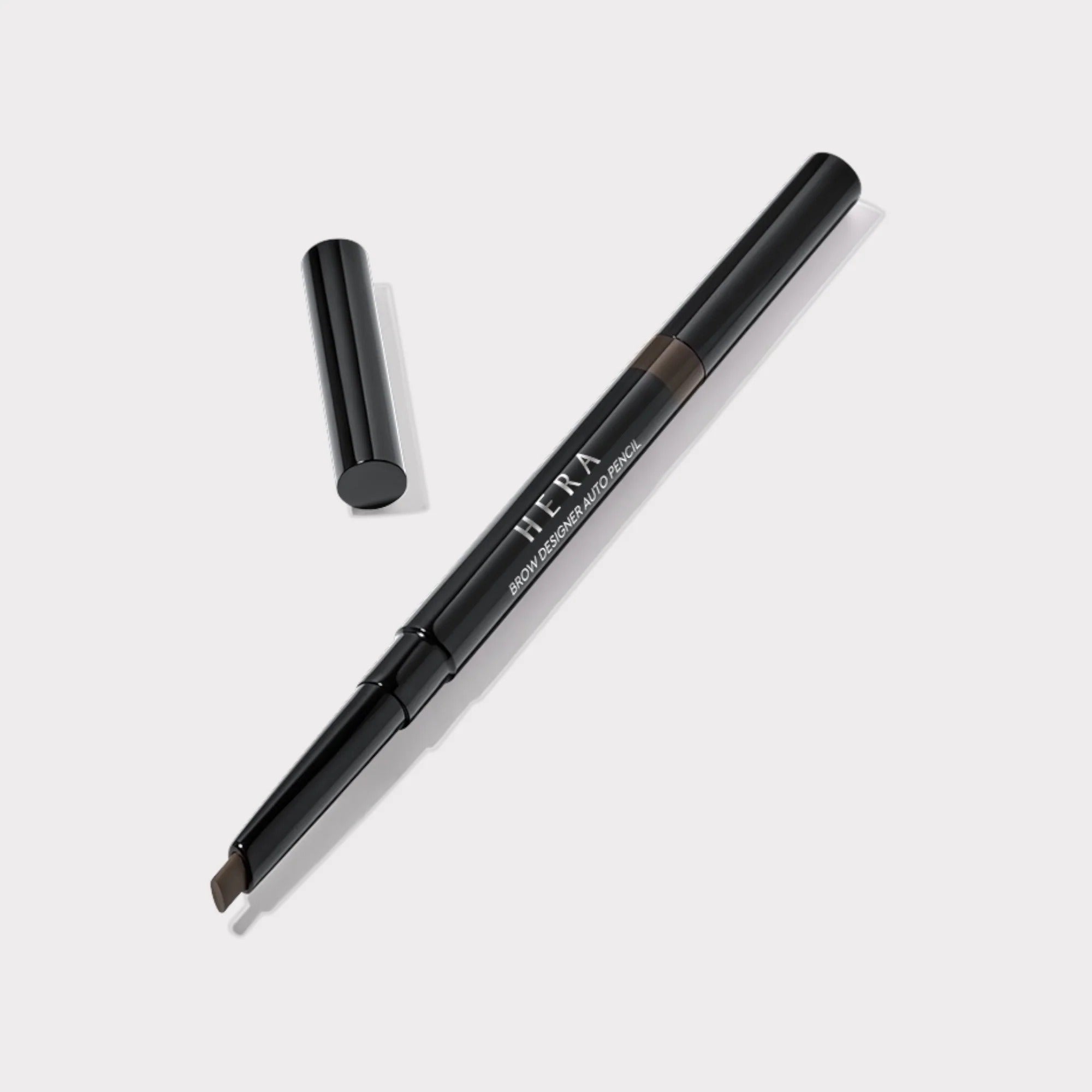 HERA Brow Desighner Auto Pencil for precise brow styling and definition. Elegant black design with retractable feature.