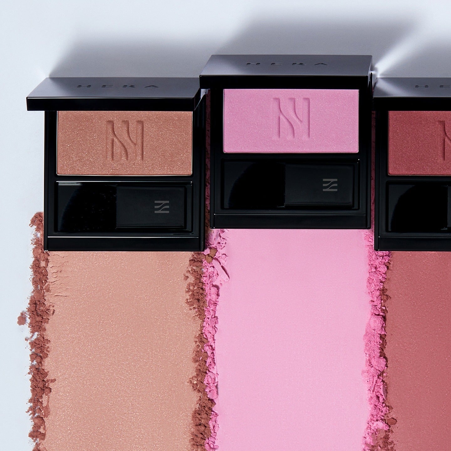 HERA Hera Blush 5.5g in three vibrant shades showcasing luxurious texture and color payoff, perfect for enhancing your makeup look.