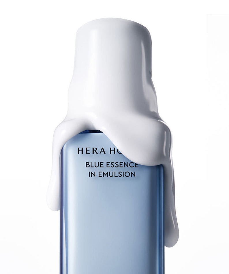 HERA Homme Blue Essence in Emulsion 110m - Gentleman Korea product shot of light blue bottle with white emulsion drip