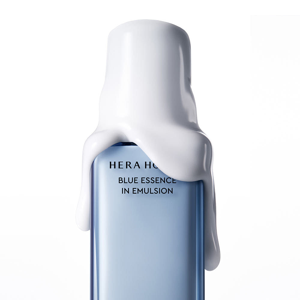 HERA Homme Blue Essence in Emulsion 110m - Gentleman Korea product shot of light blue bottle with white emulsion drip