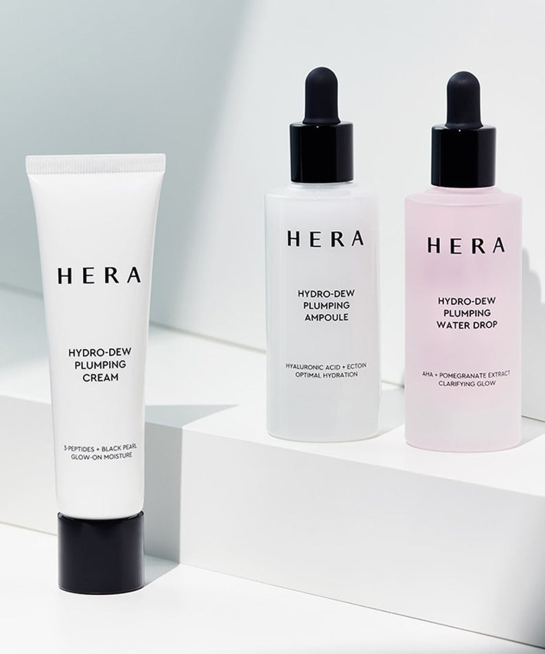 HERA Hydro-Dew Pluming Water Drop 50ml skincare product image with ampoule and cream