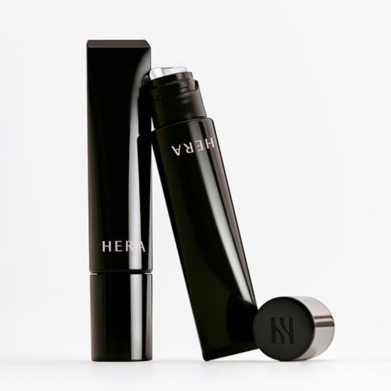 HERA Lip Serum Intense 11g - luxurious black packaging with cap off, showcasing premium lip care product.