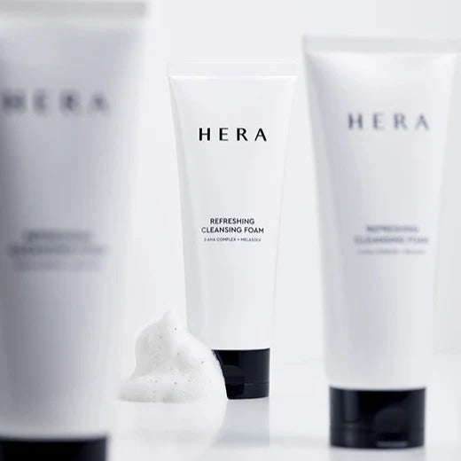 HERA Refreshing Cleansing Foam 160g in white tube with foam.