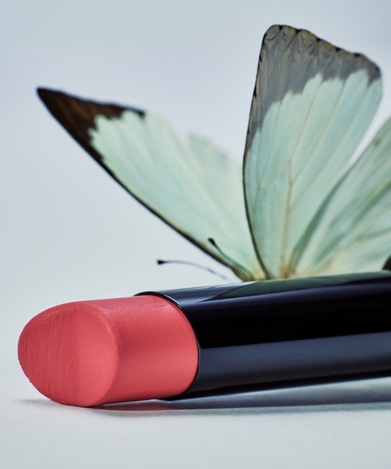 HERA Sensual Powder Matte Lipstick 3g in vivid coral with butterfly detail