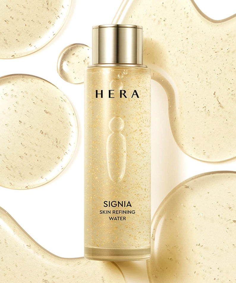HERA Signa Skin refreshing Water 180ml bottle with golden liquid, skincare product.