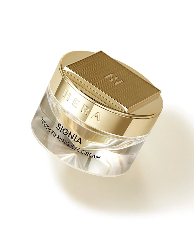 HERA Signa Youth Firming Eye Cream 30ml in a luxurious gold and clear jar, 30ml. Perfect for anti-aging skincare routine.