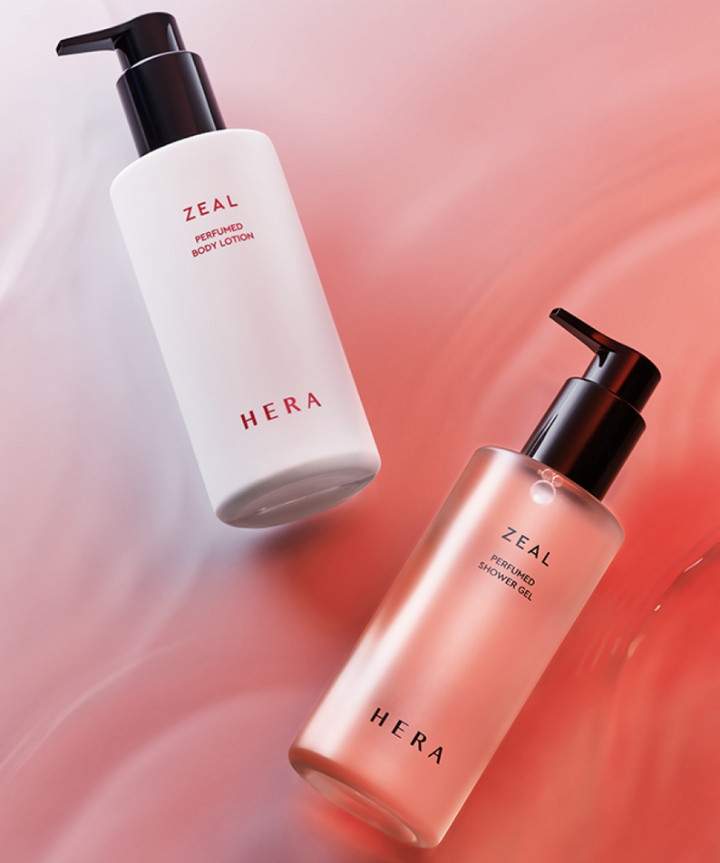HERA Zeal Blooming Perfumed Body Lotion 230ml and Shower Gel on pink background