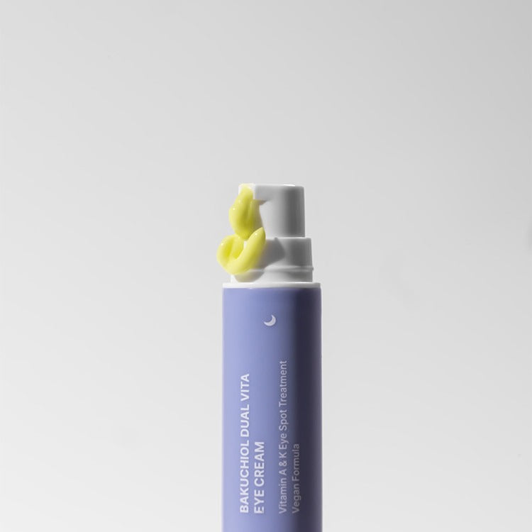 HERBLOOM Bakuchiol Dual Vita Eye Cream packaging with cream dispenser top view.