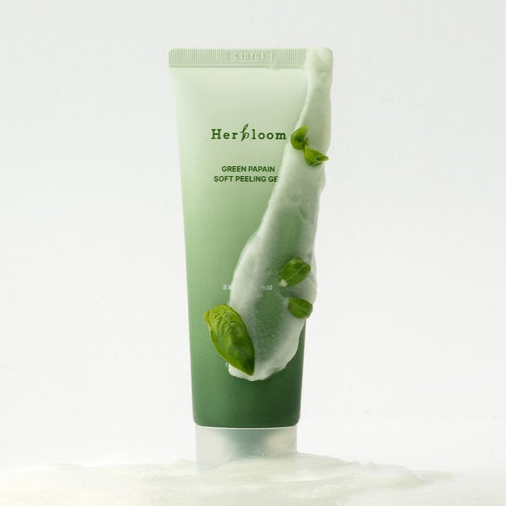 HERBLOOM Green Papain Soft Peeling Gel 120g in a tube with green design and papain leaf accents.