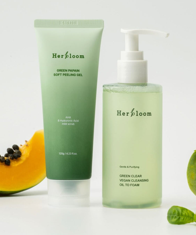 HERBLOOM Green Papain Soft Peeling Gel 120g with papaya fruits displayed.