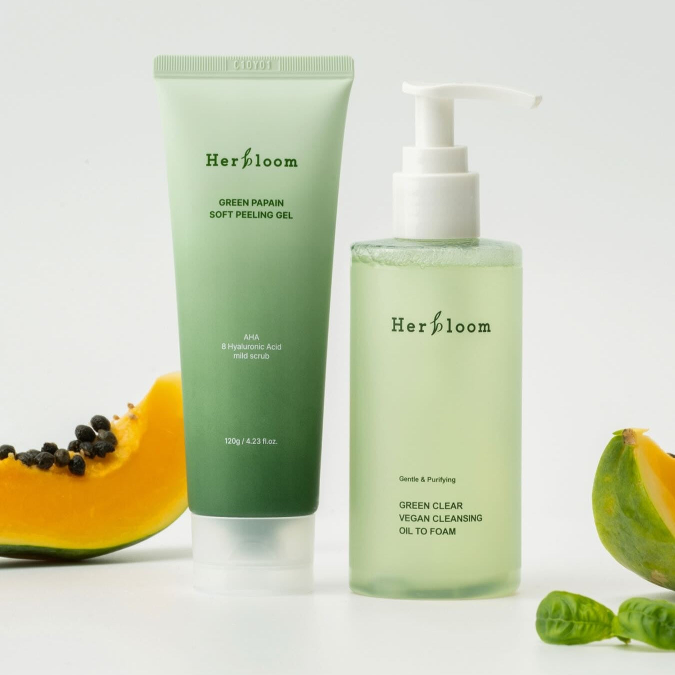 HERBLOOM Green Papain Soft Peeling Gel 120g with papaya fruits displayed.