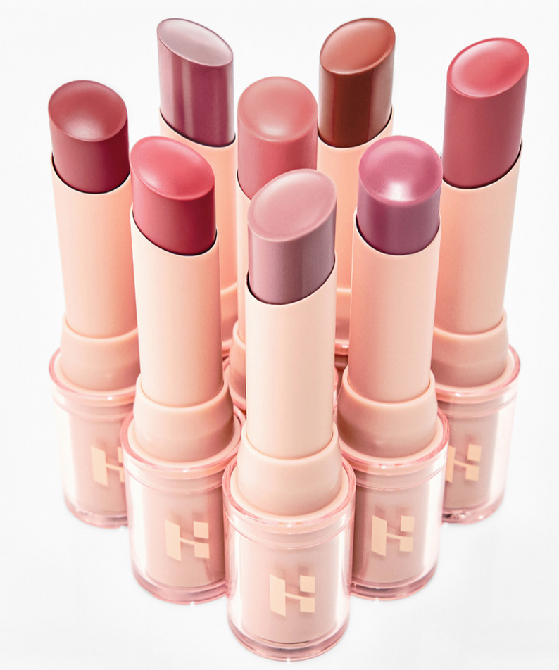 Set of 8 HOLIKA HOLIKA Glow Rise Balm lipsticks arranged showcasing various colors.