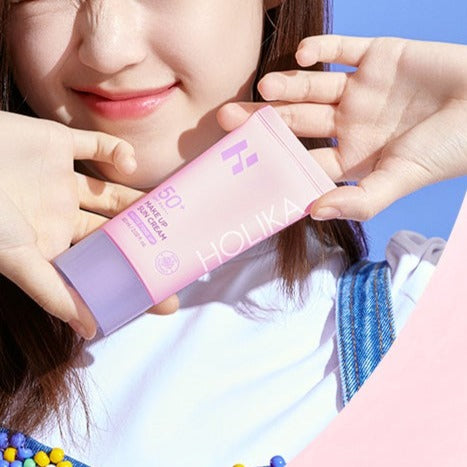 HOLIKA HOLIKA Make Up Sun Cream 60ml held by female model