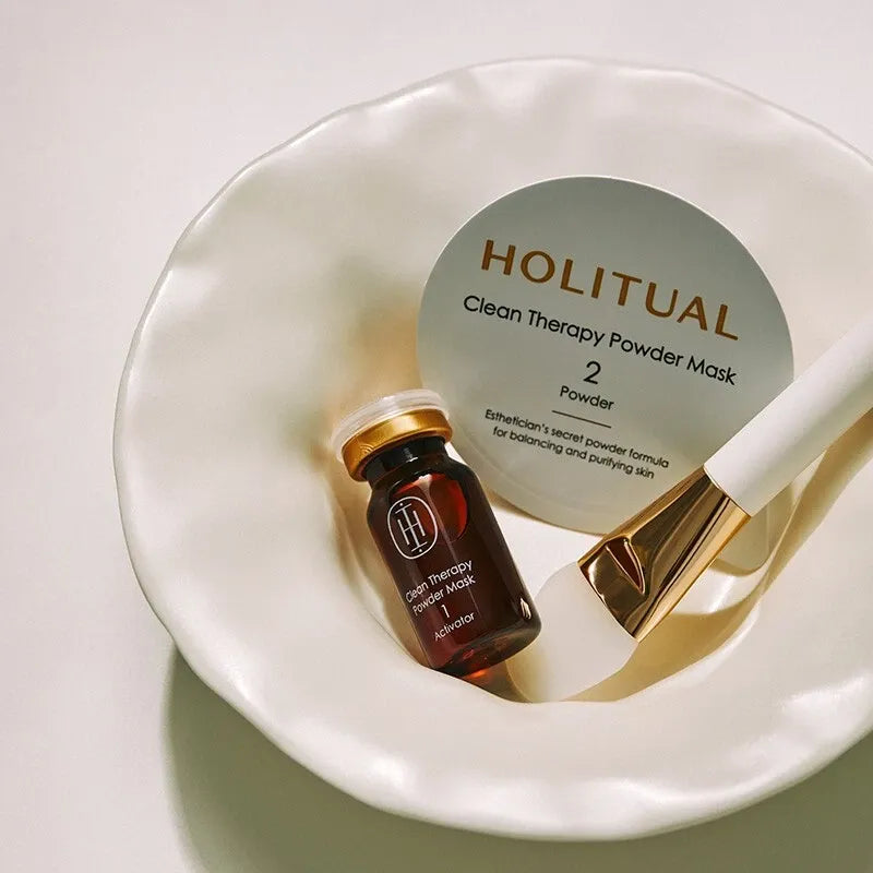 HOLITUAL Clean Therapy Powder Mask with brush in a bowl