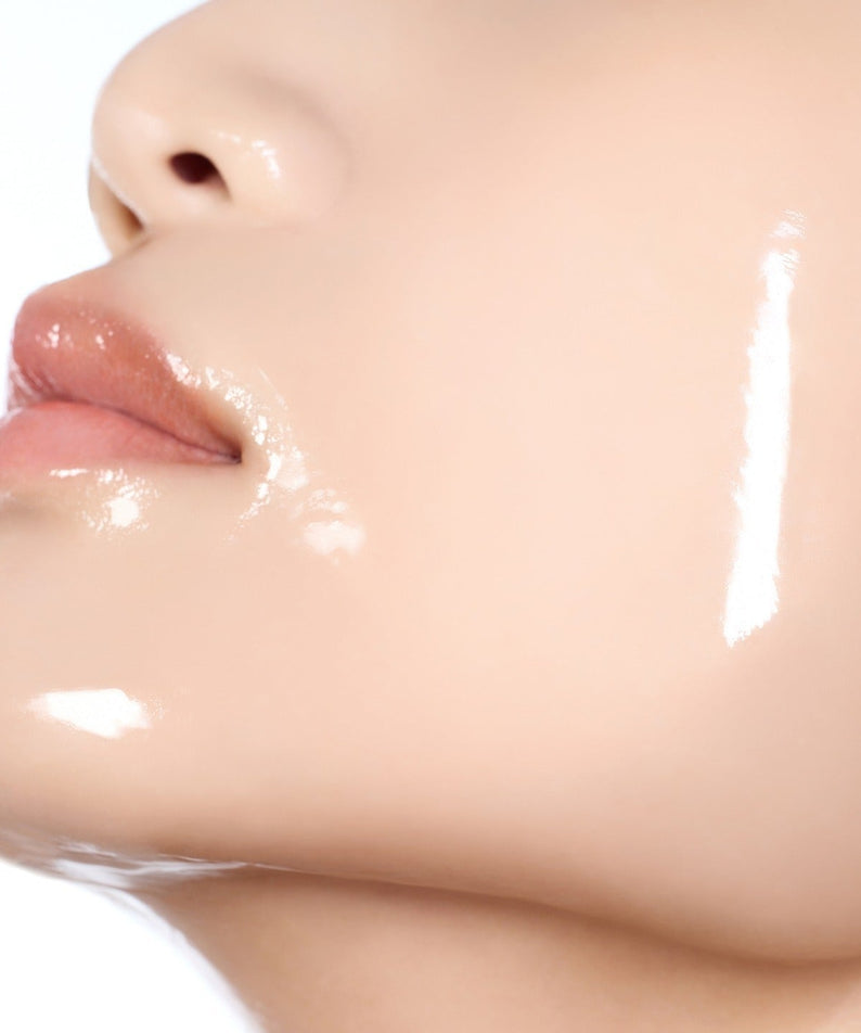 Close-up of face using HUXLEY BioSIS 360 Wrapping Gel Mask 35g, showcasing smooth, hydrated skin.