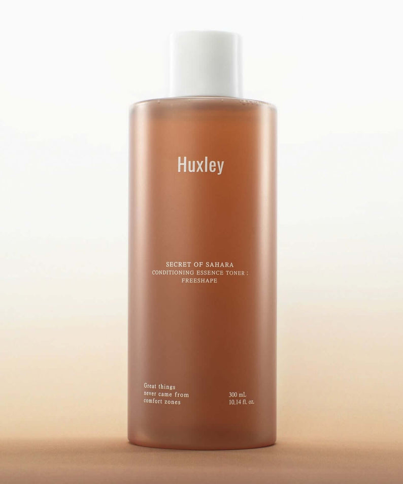 HUXLEY Conditioning Essence Toner Preshape bottle against a soft gradient background