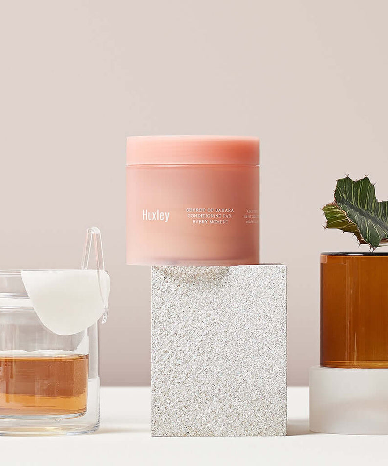 HUXLEY Conditioning Pad Every Moment with skincare setup on display