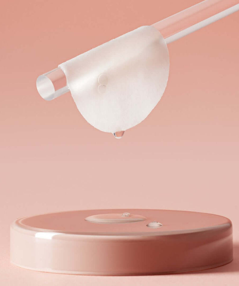 HUXLEY Conditioning Pad Every Moment placed on a sleek pink surface