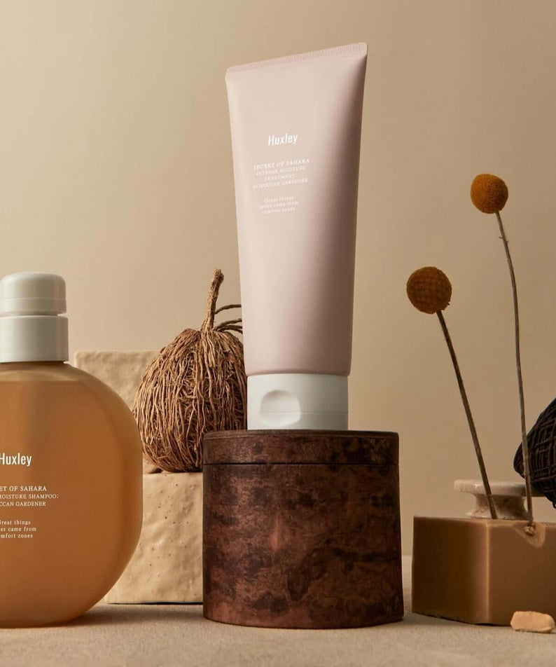HUXLEY Intense Moisture Treatment Moroccan Gardener with elegant packaging on a stylish backdrop