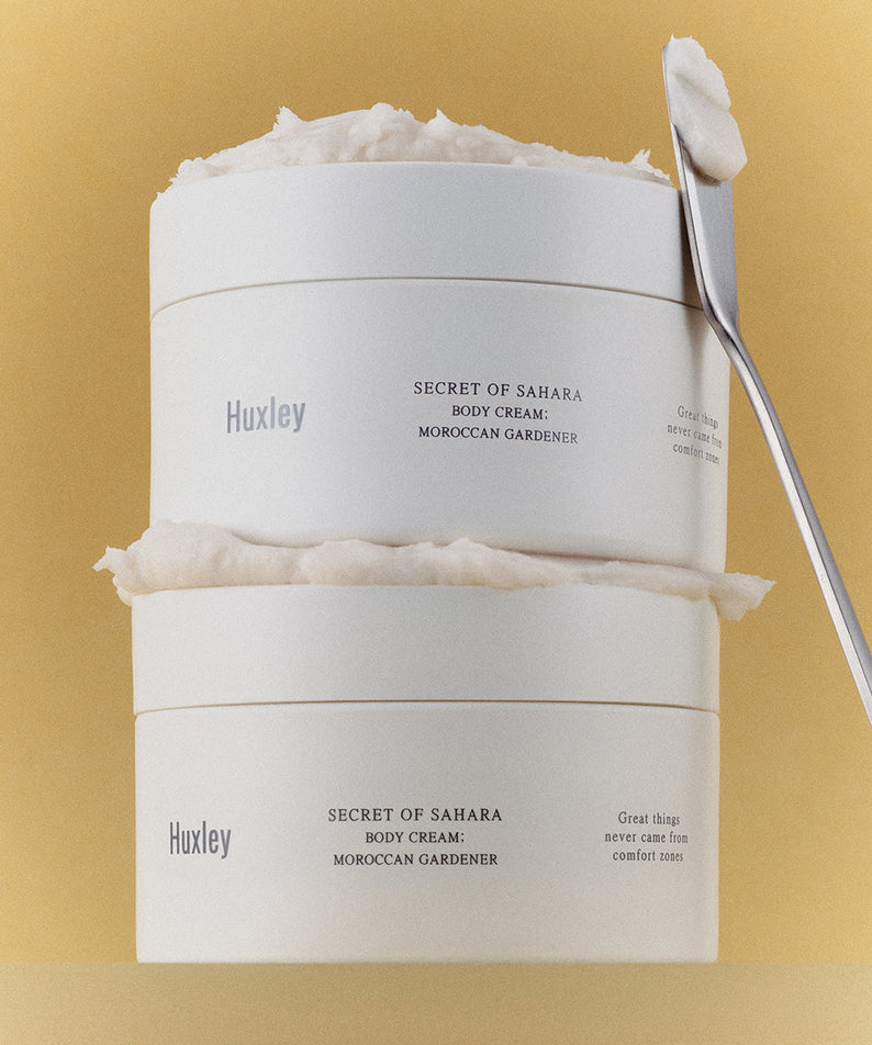 HUXLEY Moroccan Gardener Body Cream 200ml stacked jars with spatula on a beige background