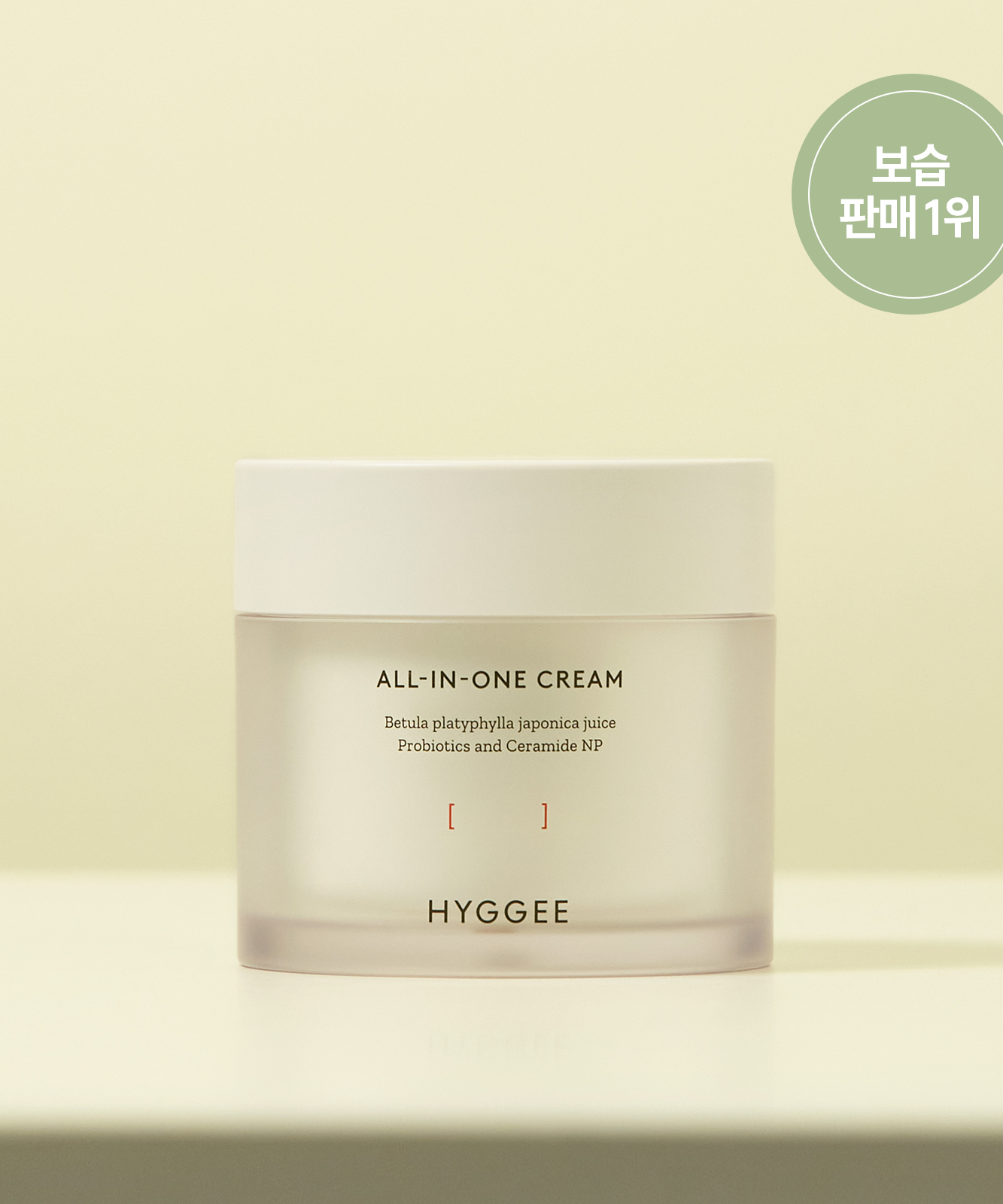 HYGGEE All-In-One Cream 80g jar on a light background, showcasing skincare product with natural ingredients.