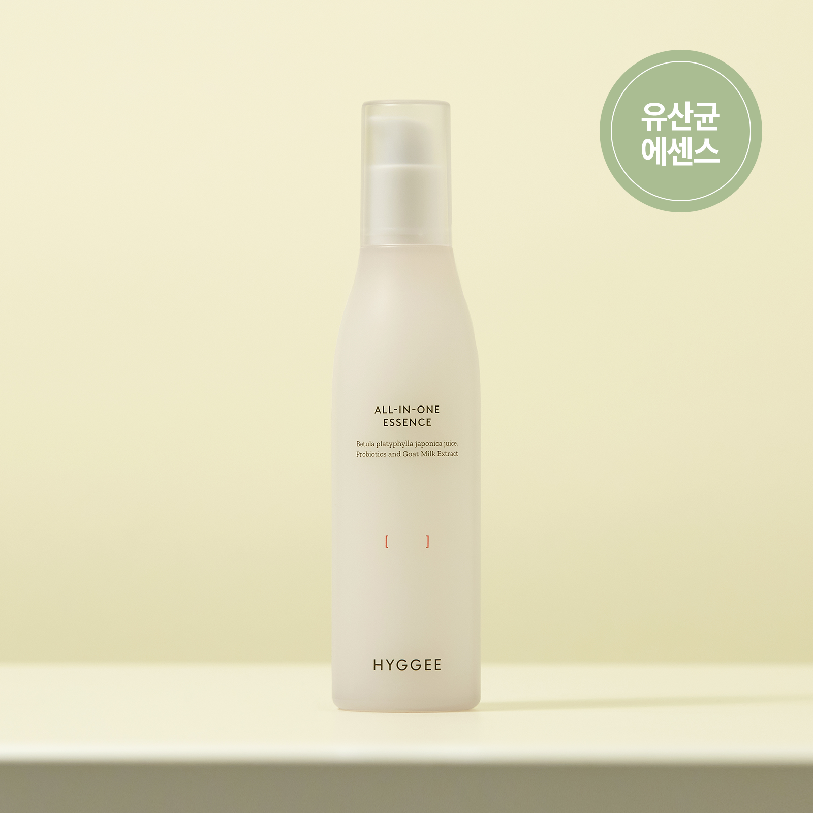 HYGGEE All-In-One Essence 110ml bottle on a table, skincare product with Korean labeling, minimalist design