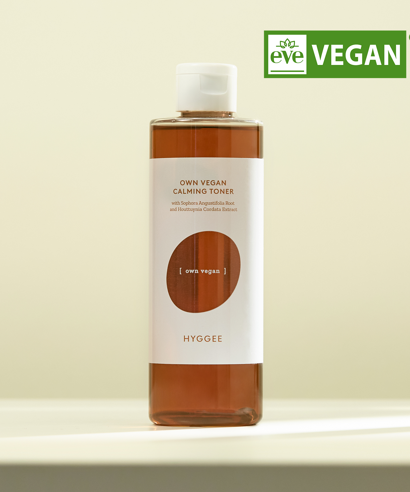 Bottle of HYGGEE Own Vegan Calming Toner 250ml with eveVEGAN logo.