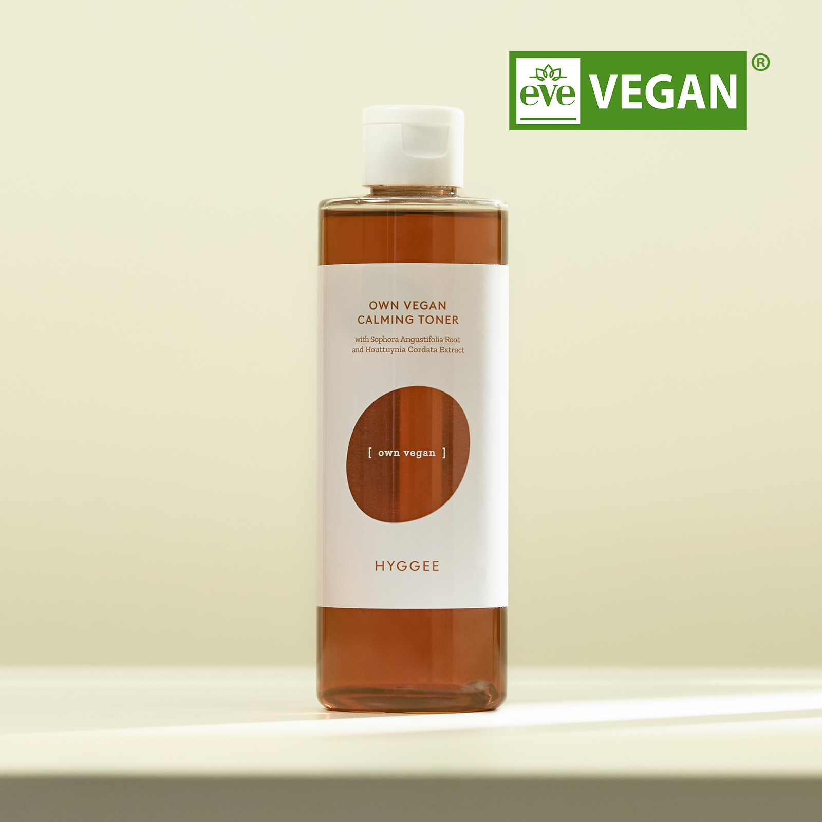 Bottle of HYGGEE Own Vegan Calming Toner 250ml with eveVEGAN logo.