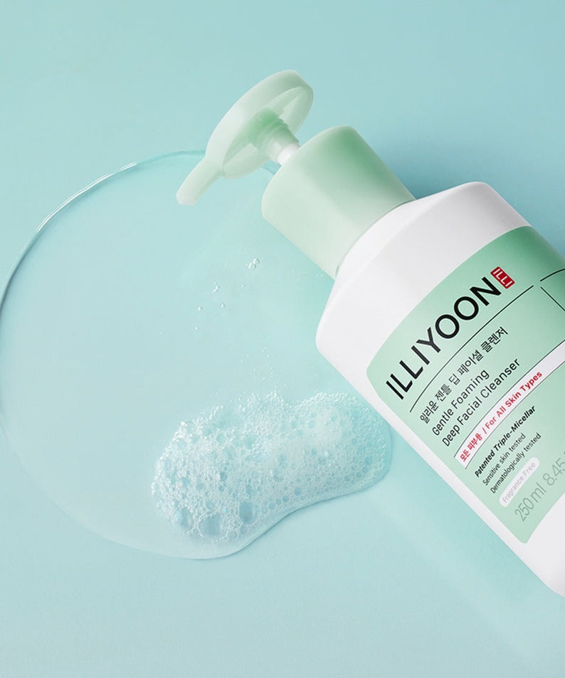 Bottle of ILLIYOON Gentle Deep Facial Cleanser 250ml with foamy texture on a mint background