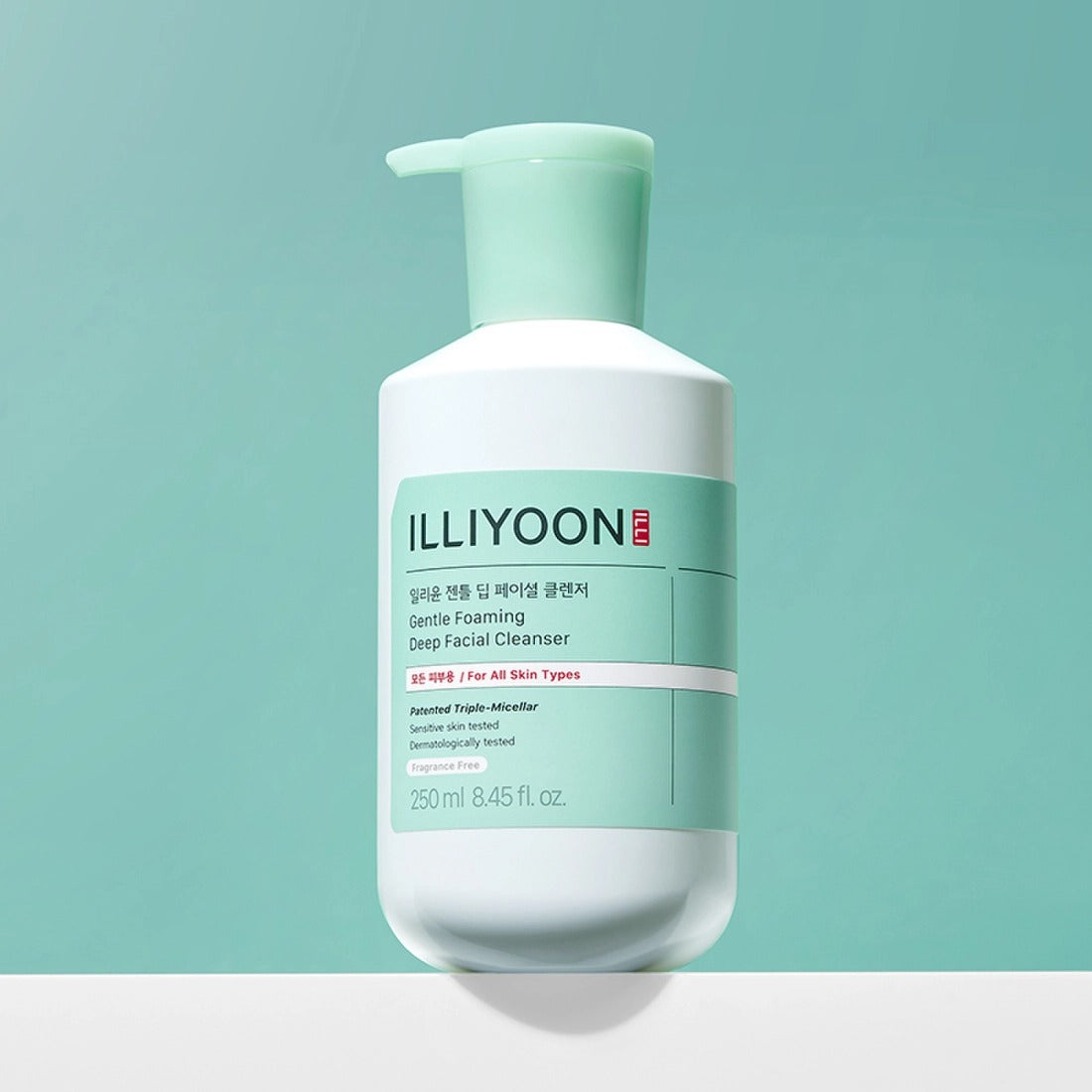 ILLIYOON Gentle Deep Facial Cleanser 250ml bottle on a green background