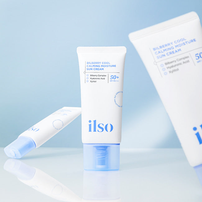 ILSO Bilberry Cool Calming Moisture Sunscreen tubes on a blue background
