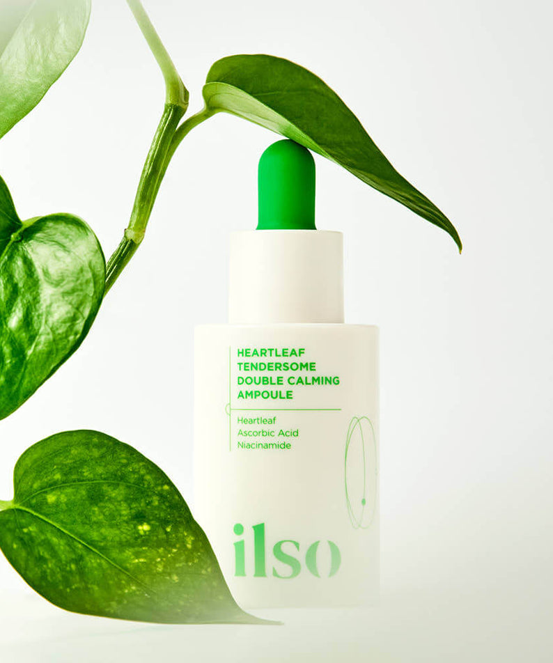 ILSO Eoseongcho Tenderjom Double Calming Ampoule 30ml bottle with green leaves, promoting calming skincare benefits.