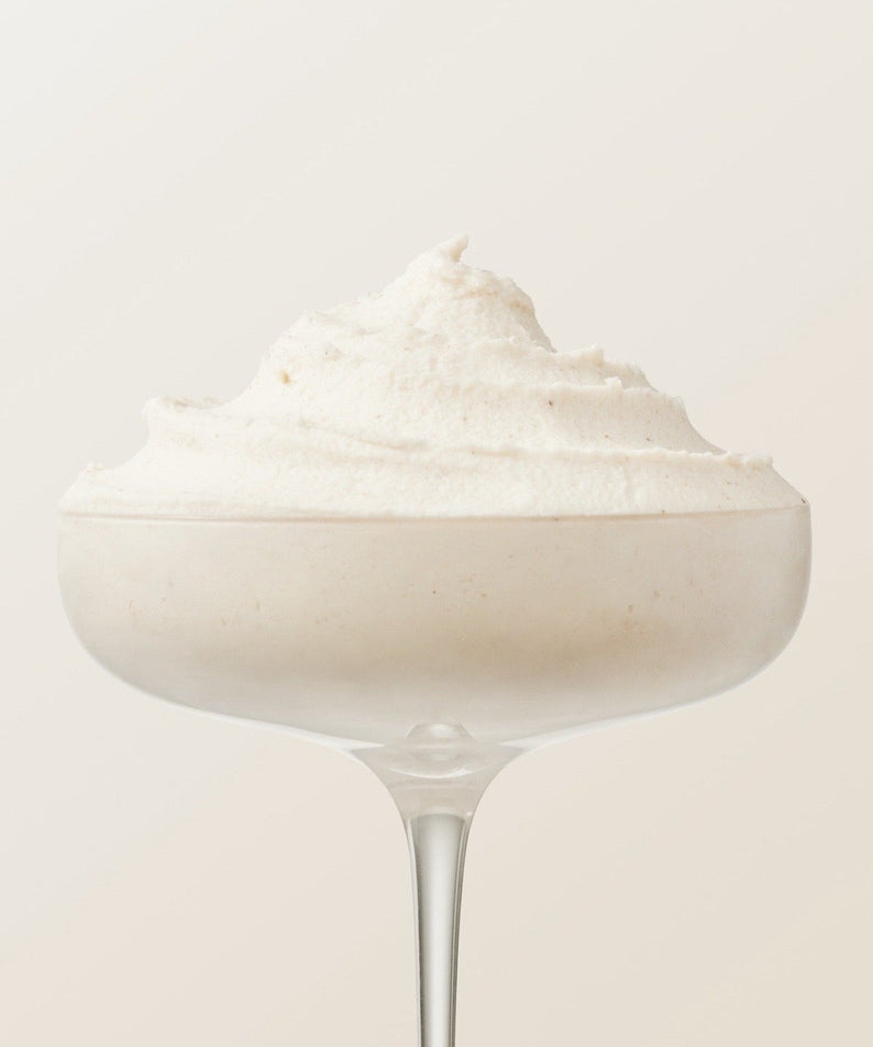 ILSO Rice Potato Pore Fresh Wash-Off 150g cream texture in elegant glass, showcasing luxurious skincare product appearance.