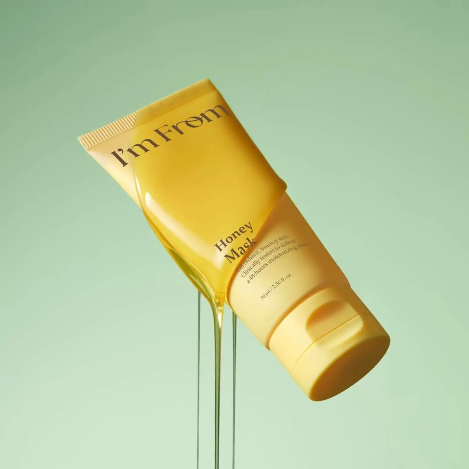 I'M FROM Honey Mask 70ml product image with honey draping over yellow tube against green background