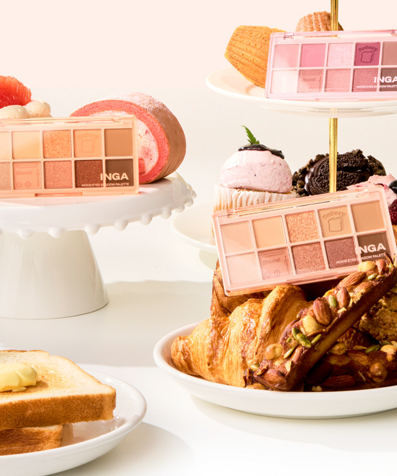INGA Mood Eyes Shadow Palette displayed with pastries and desserts, showcasing a variety of colors for versatile eye makeup looks.