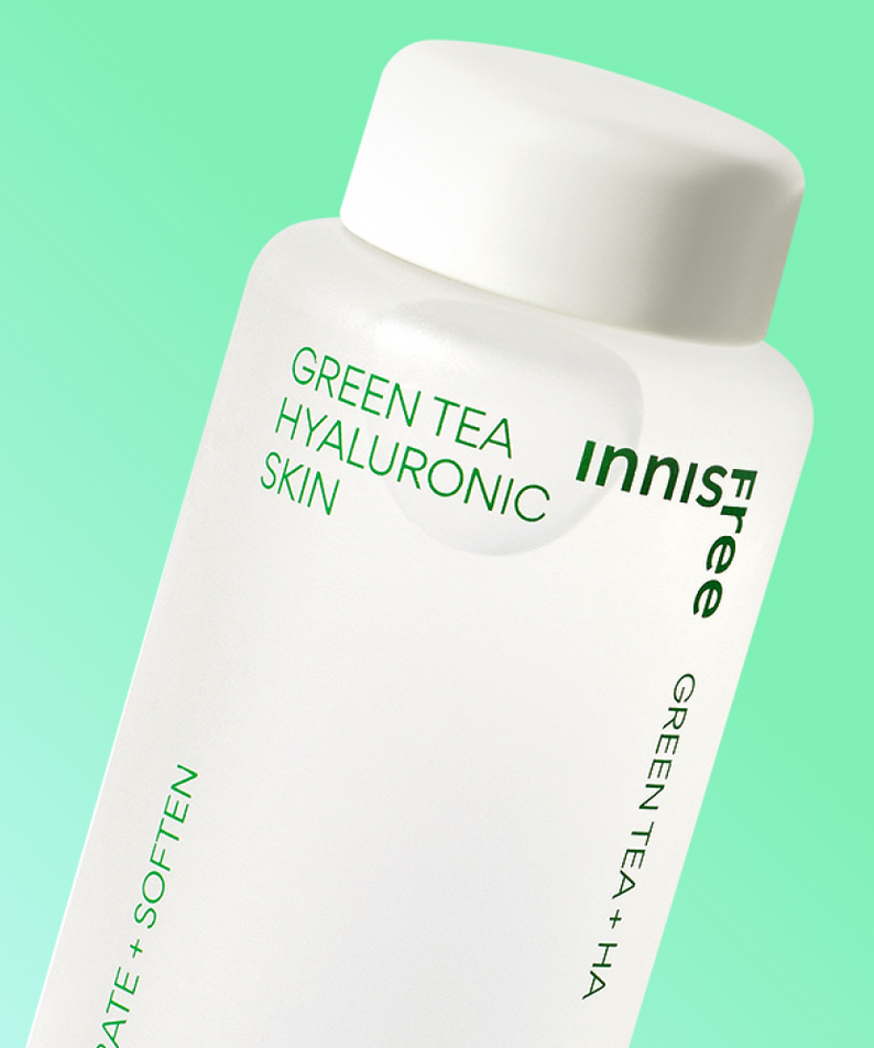INNISFREE Green tea Hyaluronic Skin 170ml bottle on a green background showcasing product design and label information.