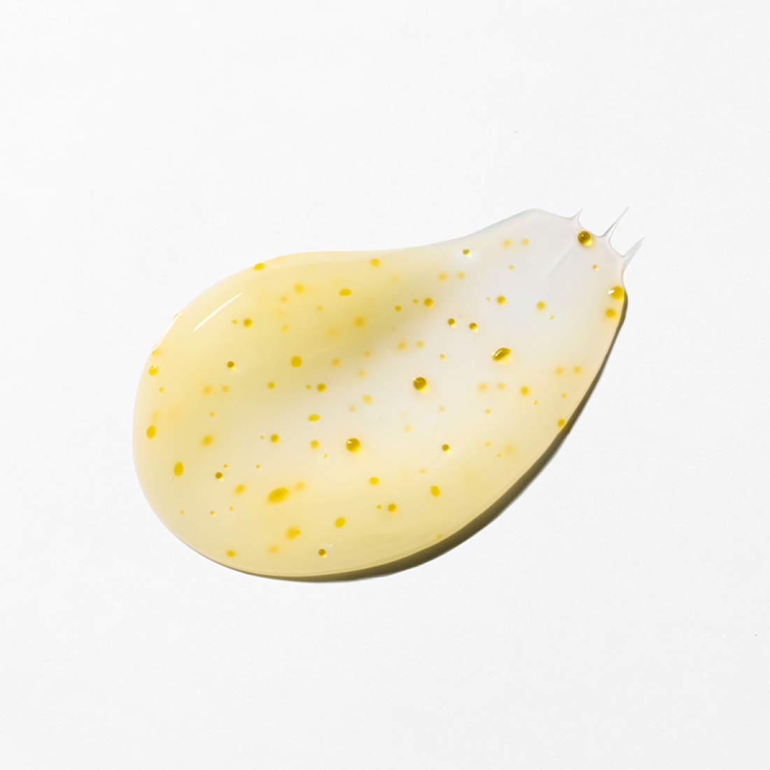 Texture of INNISFREE Vitamin C Enzyme Brightening Cream 50ml on white background