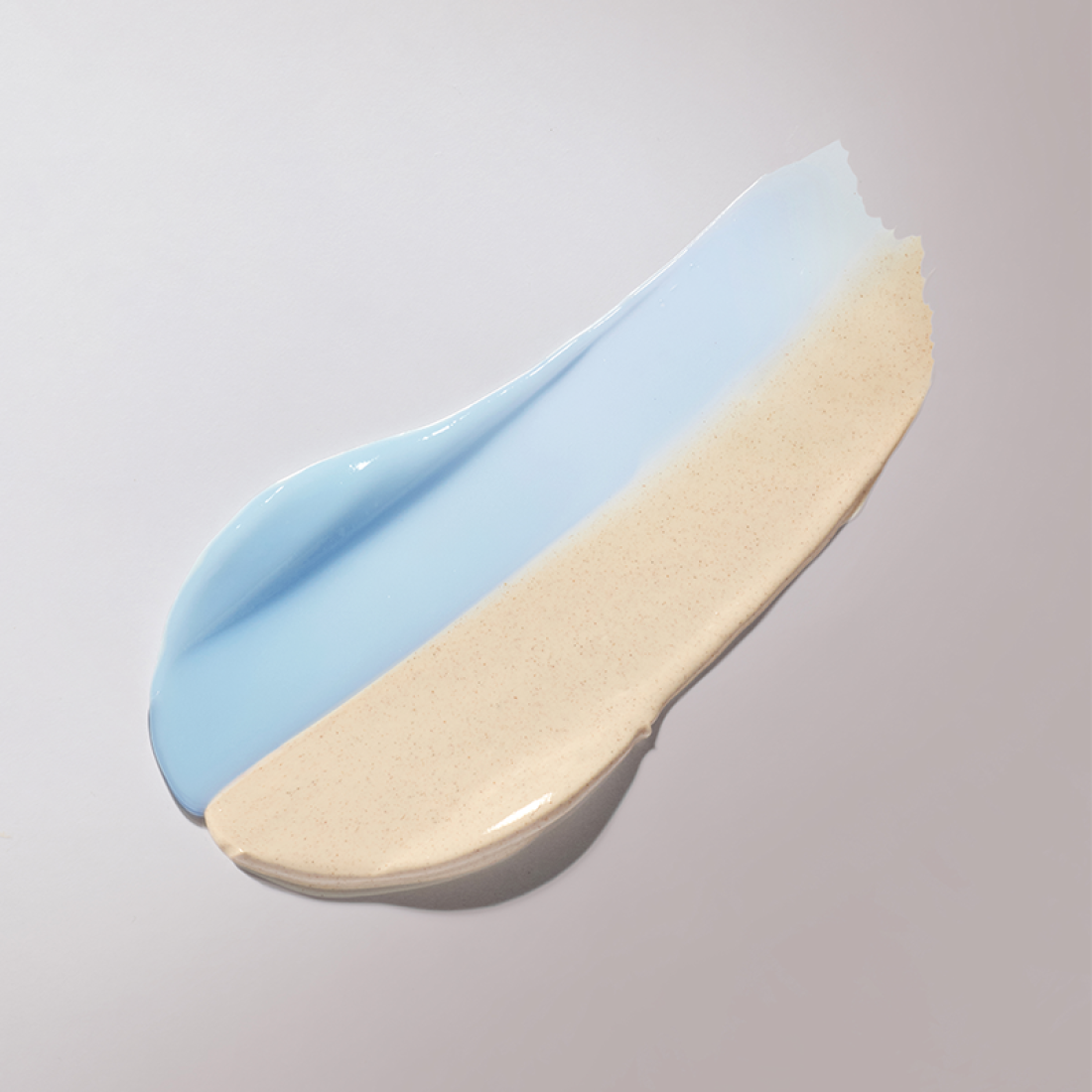 INNISFREE Volcanic Pore Dual Mask 110ml texture, showcasing dual-layer mask with vibrant colors and smooth application for skincare.